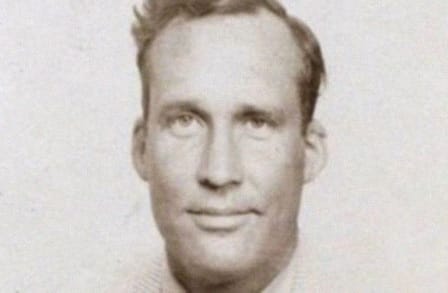 Black and white headshot of poet James Laughlin.