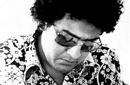 Black and white headshot of poet Frank Lima.