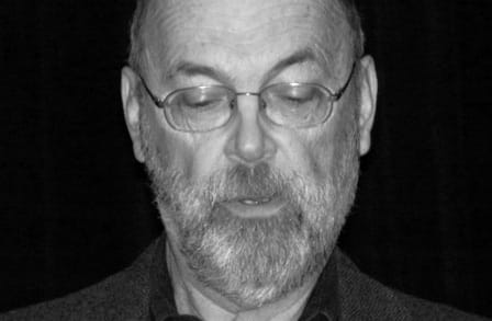 Black and white headshot of poet James McKean