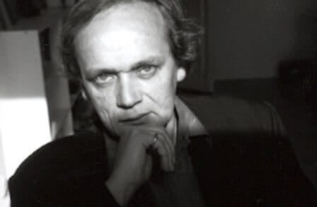 Black and white headshot of poet Joachim Sartorius, taken by Nan Goldin.