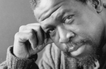 Black and white photograph of poet Primus St. John
