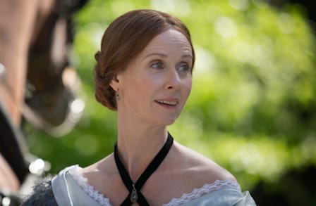Film still from A Quiet Passion, featuring an actress portraying Emily Dickinson