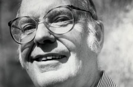 Close-up black and white photograph of poet and children's book author X. J. Kennedy