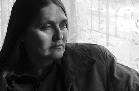 Black and white headshot of poet Allison Adelle Hedge Coke
