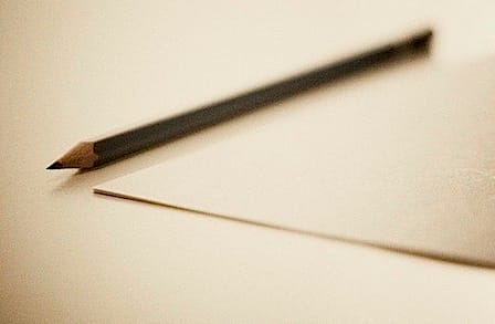 Image of a pencil and paper