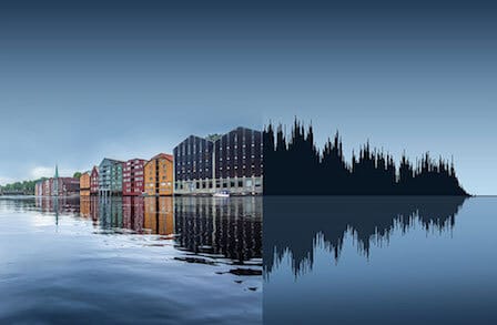 Image of buildings on a waterfront becoming a sound wave