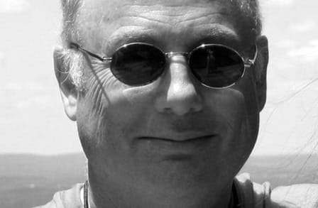 Black and white headshot of writer Dave Smith.