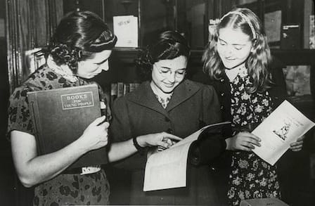 Image of students sharing books