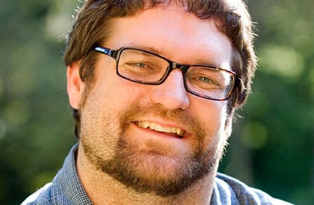 Headshot of poet Troy Jollimore outdoors.