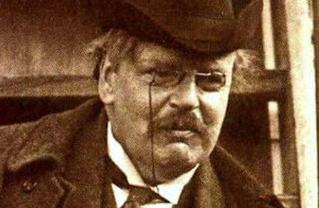 Headshot of poet G.K. Chesterton in a bowler hat.