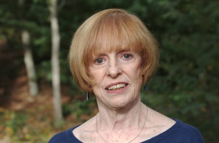 Headshot of poet Martha Collins outdoors.