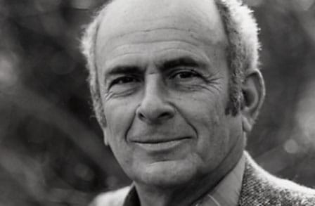 Black and white headshot of writer Louis Simpson outdoors.