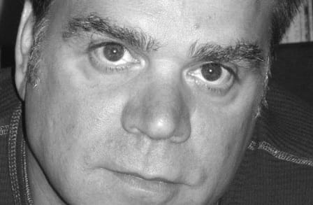 Black and white headshot of poet Peter Gizzi