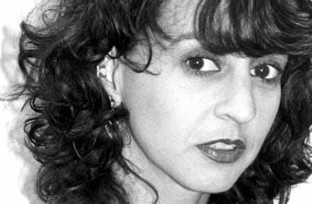 Black and white photograph of Kim Addonizio