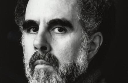 Black and white headshot of poet A.F. Moritz.