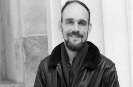 Black and white  headshot of poet Karl Kirchwey.
