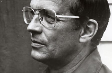 Side headshot of poet Philip Booth.