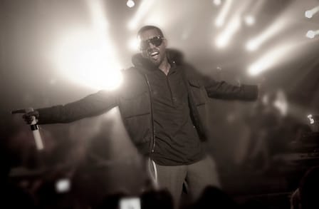 Image of Kanye West performing a concert.