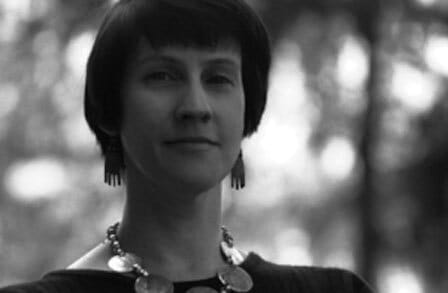 Black and white headshot of poet Catherine Sasanov