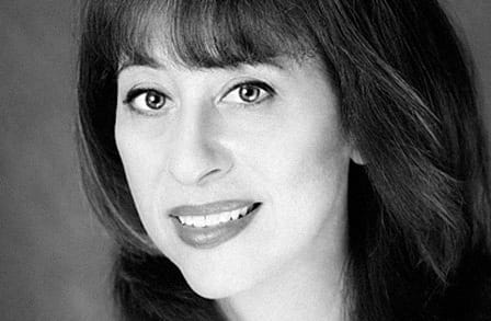 Black and white headshot of poet Michele Wolf.