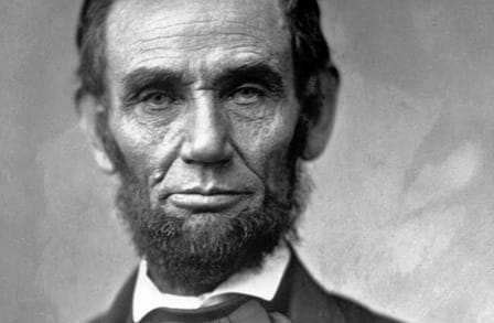 Black and white headshot of President Abraham Lincoln.