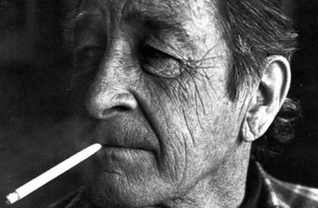 Black and white headshot of poet Thomas McGrath.