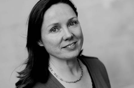 Black and white headshot of poet Lavinia Greenlaw.