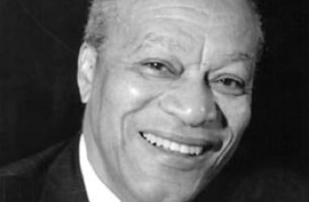 Black and white headshot of poet Jay Wright.