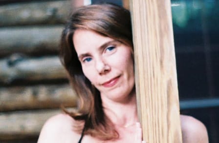Color headshot of poet Laura Newbern