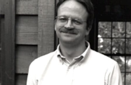 Black and white headshot of poet Michael McFee