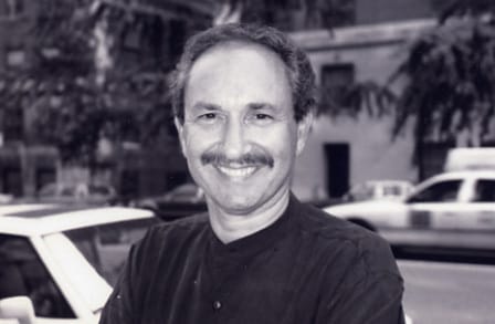 Black and white headshot of poet Frederick Feirstein.