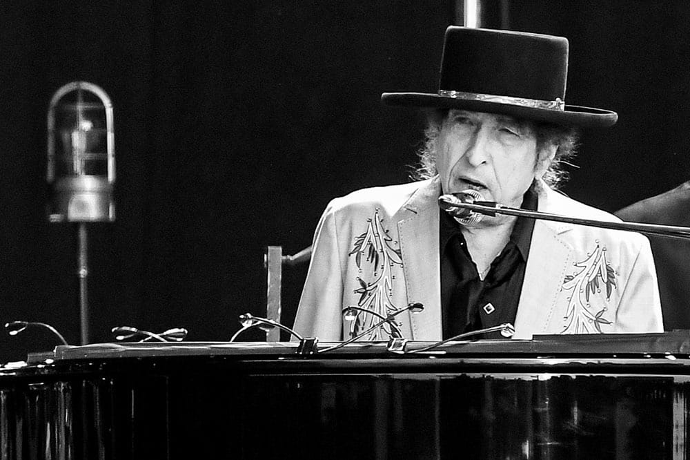 Portrait of Bob Dylan performing