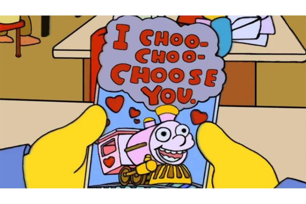 Ralph from the Simpsons holding a valentine that says I choo-choo-choose you