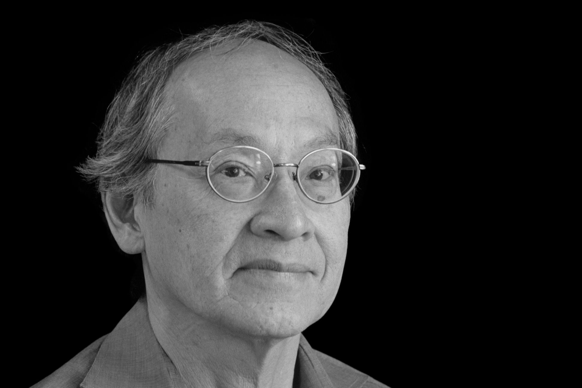 Black and white portrait of poet Arthur Sze