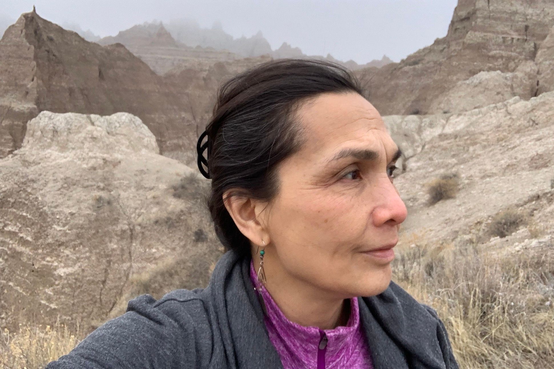 A White woman rock hiking