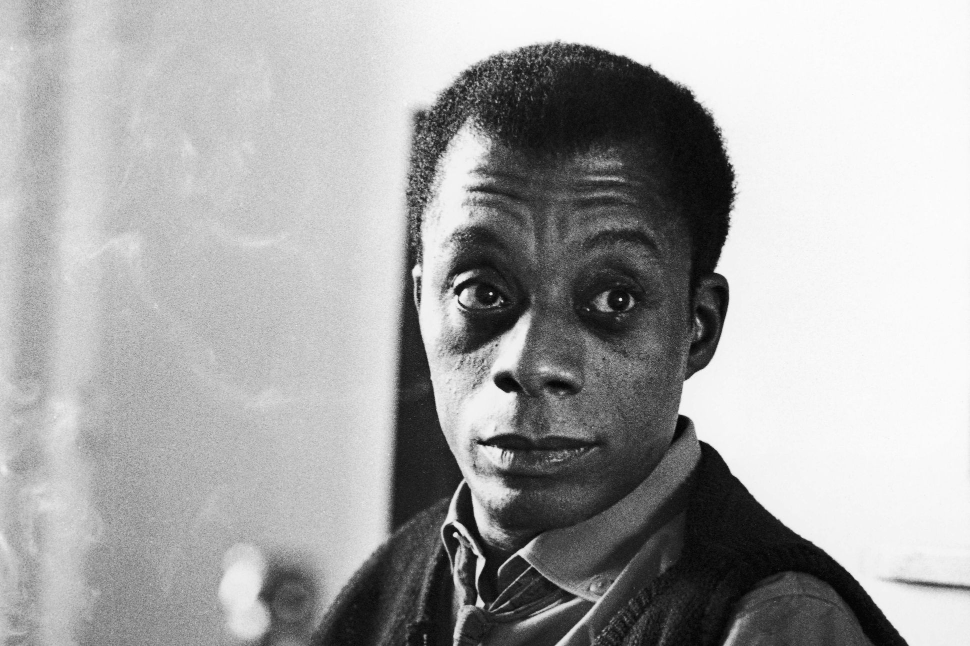 Black and white image of James Baldwin.