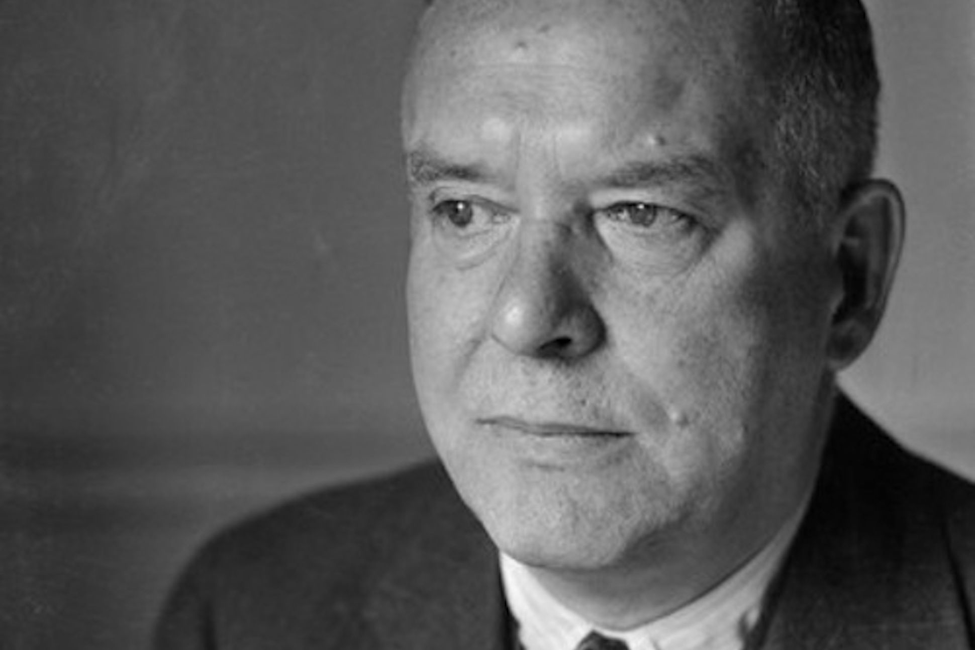 Close up image of the poet Wallace Stevens, black and white.