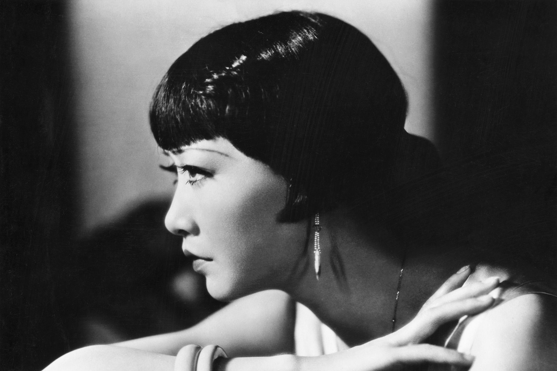Actress Anna May Wong poses in a black-and-white film still for the Paramount mystery drama "Daughter of the Dragon."