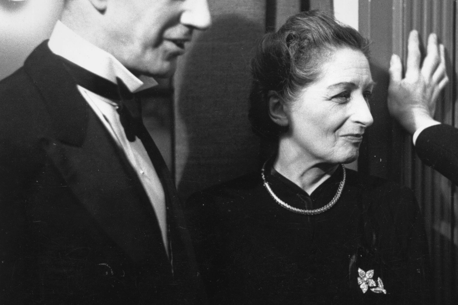 1st February 1949: English novelist and autobiographer Vera Mary Brittain (1893 - 1970) and her husband George Catlin talk to the secretary of the PEN Club Herman Ould. They are celebrating the opening of the club's new headquarters in Chelsea. Original P