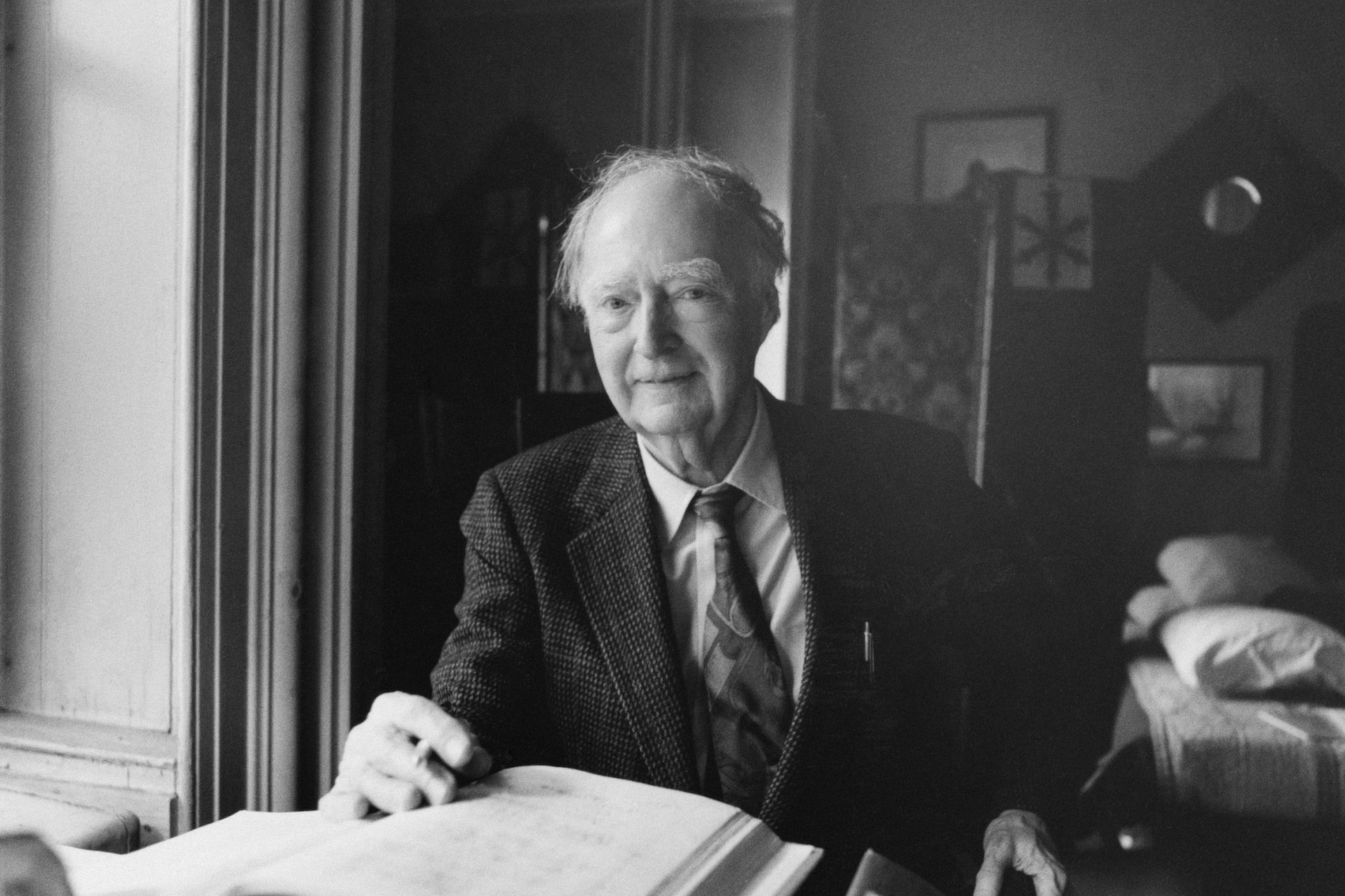 Black and white portrait of James Purdy in his study.