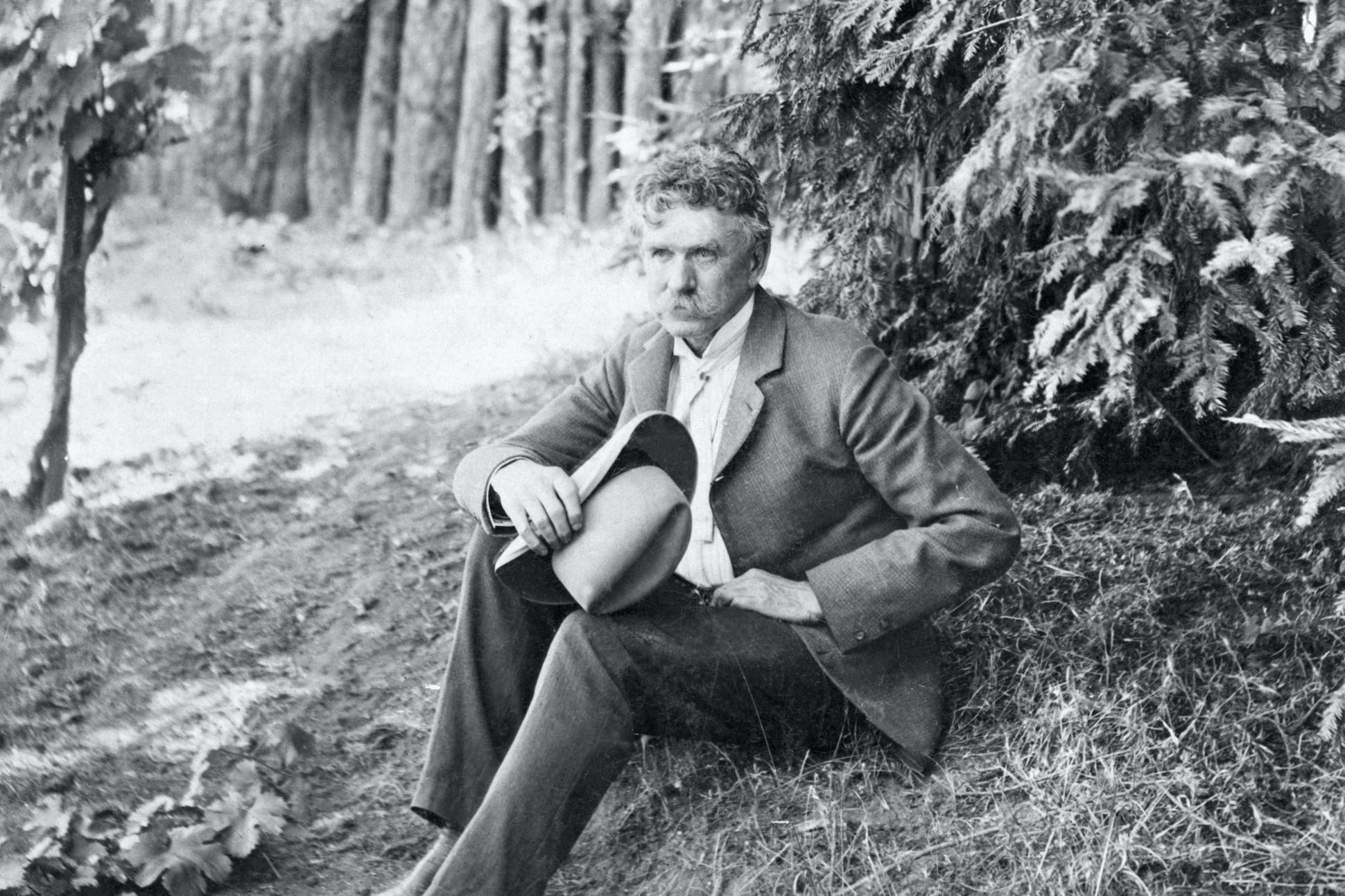 Ambrose Bierce Seated Under Tree