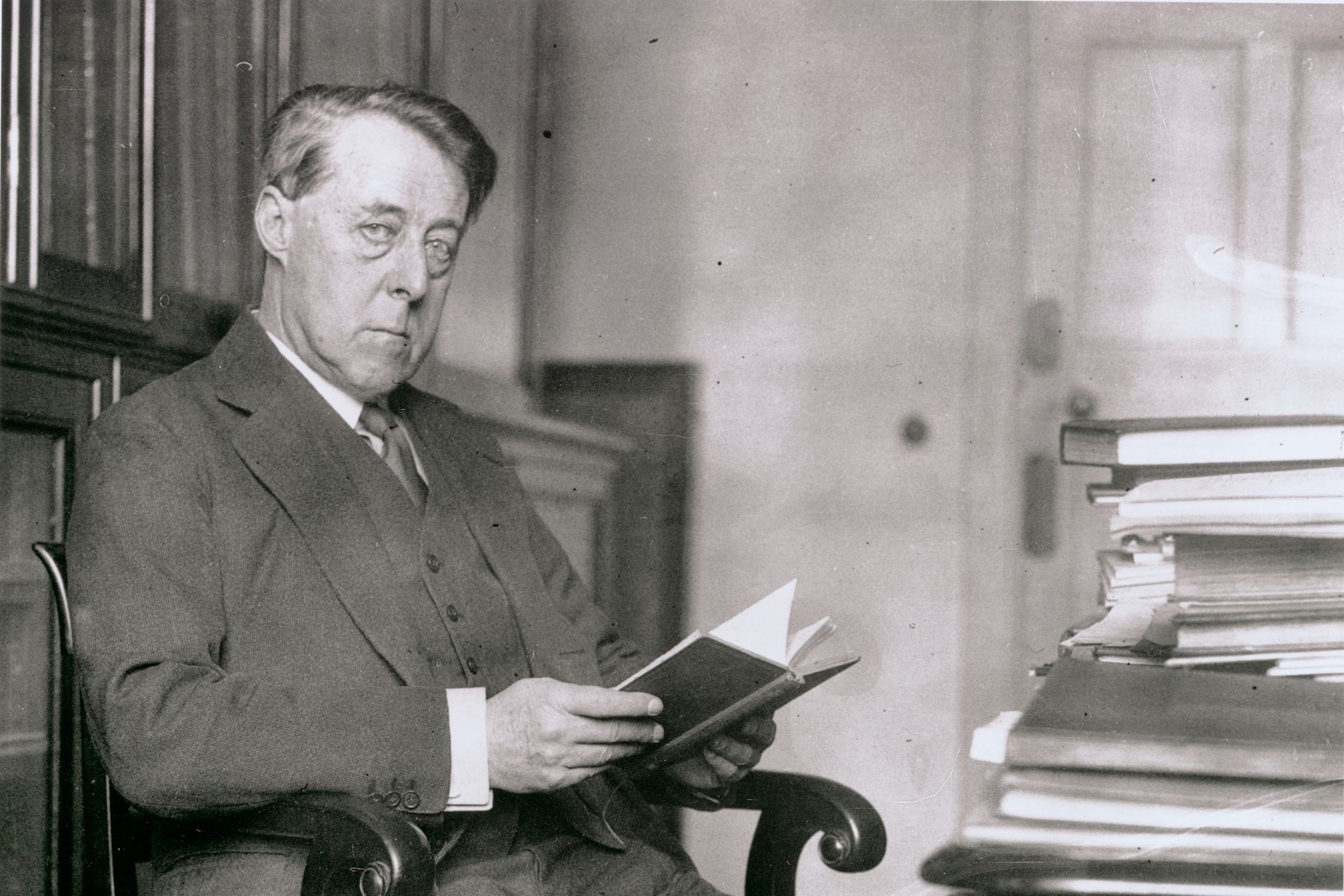 Laurence Binyon Seated with Books