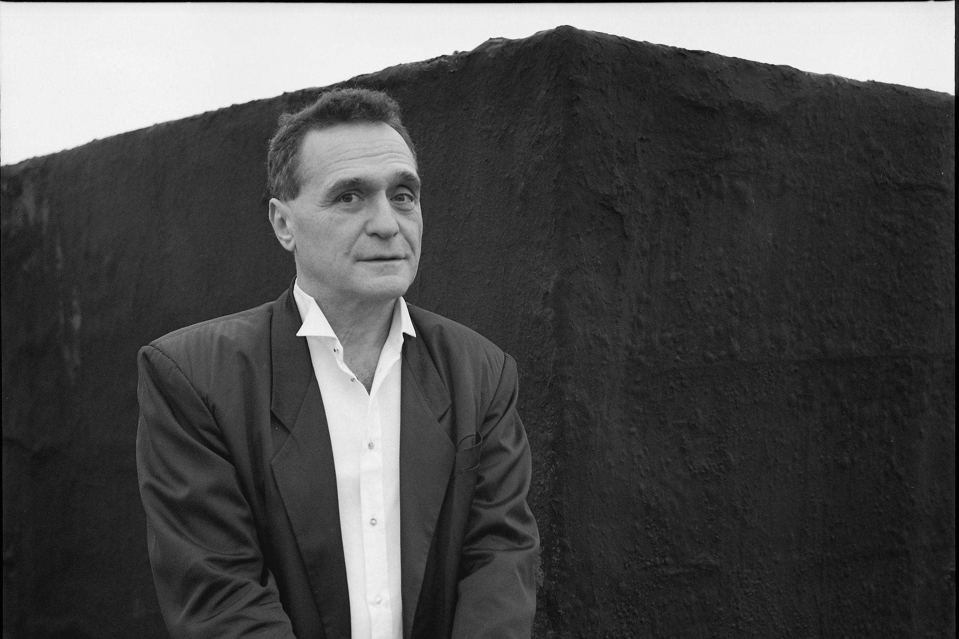 Portrait of American poet and performance artist John Giorno (1936 - 2019) as he poses on the roof of the Bunker (the name of author William Burroughs' home), on the Bowery, New York, New York, February 2, 1991.