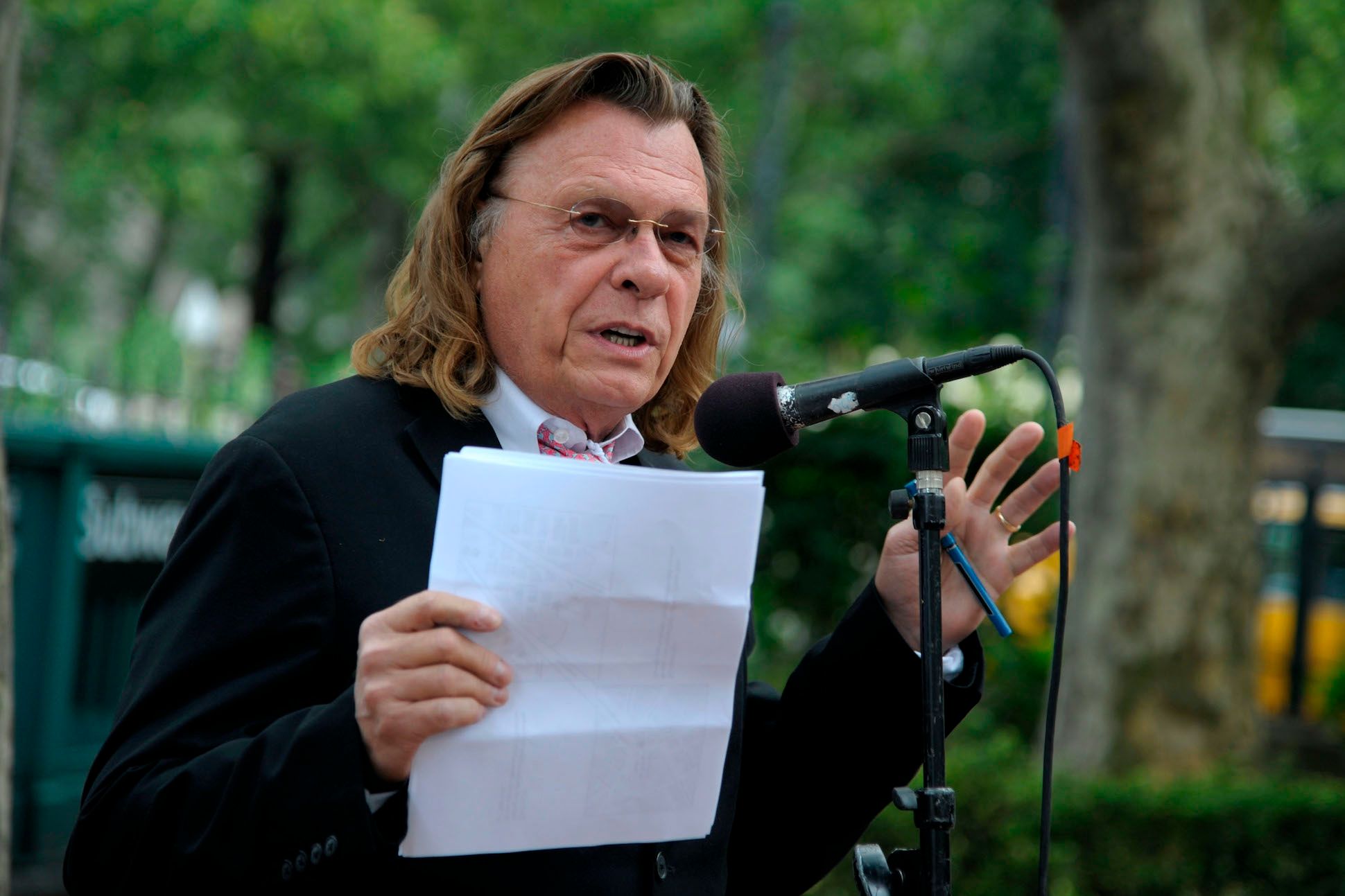 Poet Thomas Lux speaks during Poets House's 17th Annual Poetry Walk Across The Brooklyn Bridge on June 11, 2012 in Brooklyn, New York