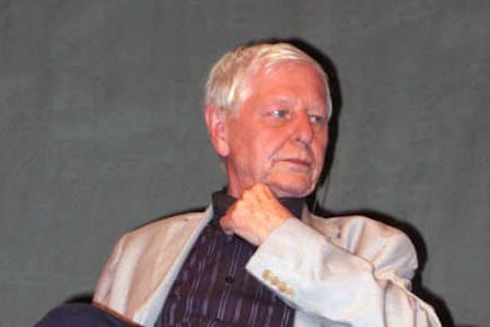Headshot of poet Mariusz Kubik
