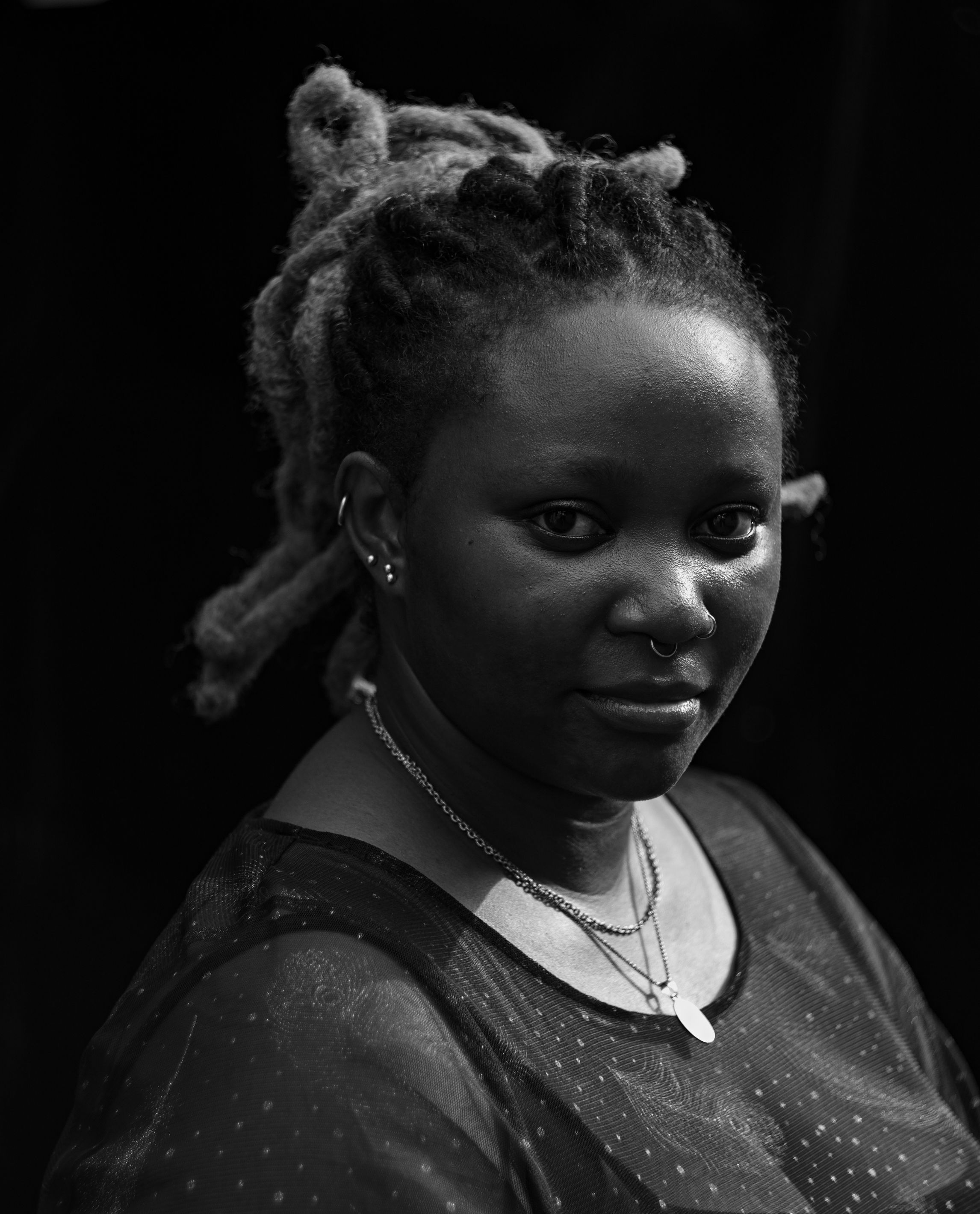 Headshot of Iyanuoluwa Adenle